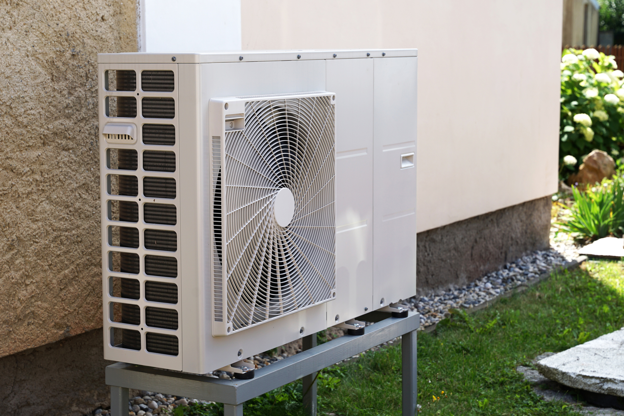 Heat pump mounted outside a Southeast Michigan home